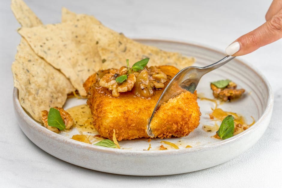 Friterte søte osteravioli med honning