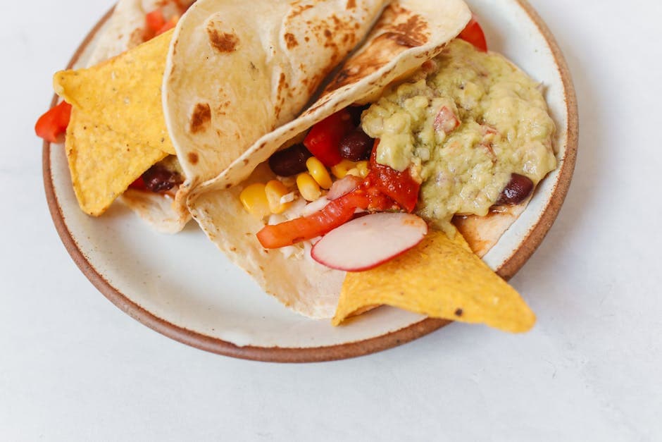 Zucchini- og mais-tacos med svarte bønner