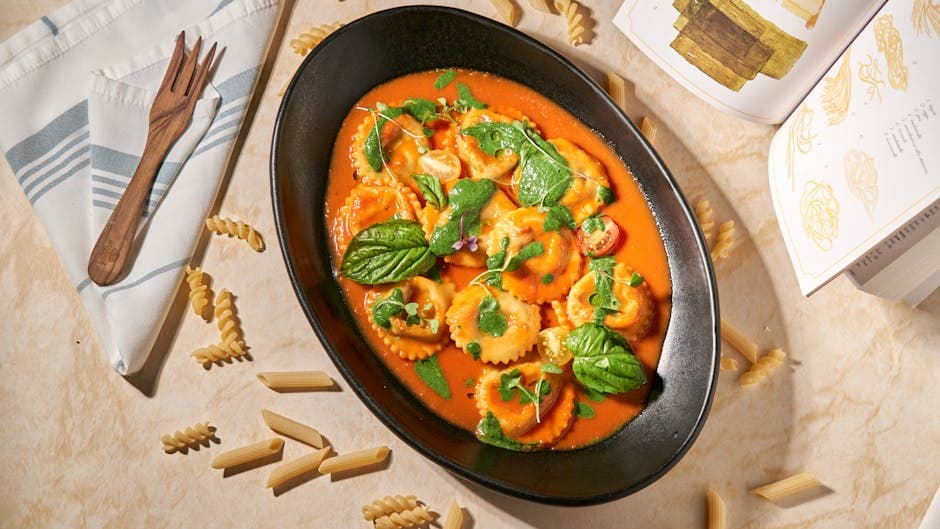 Hummerravioli med kremet tomatsaus