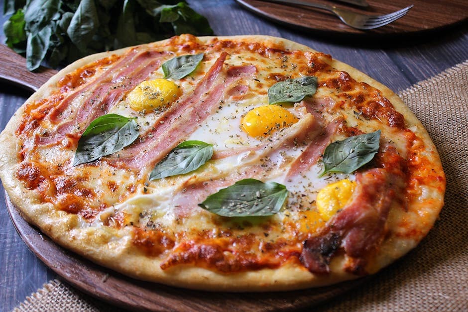 Pizza med prosciutto, spinat, trøffelolje og egg