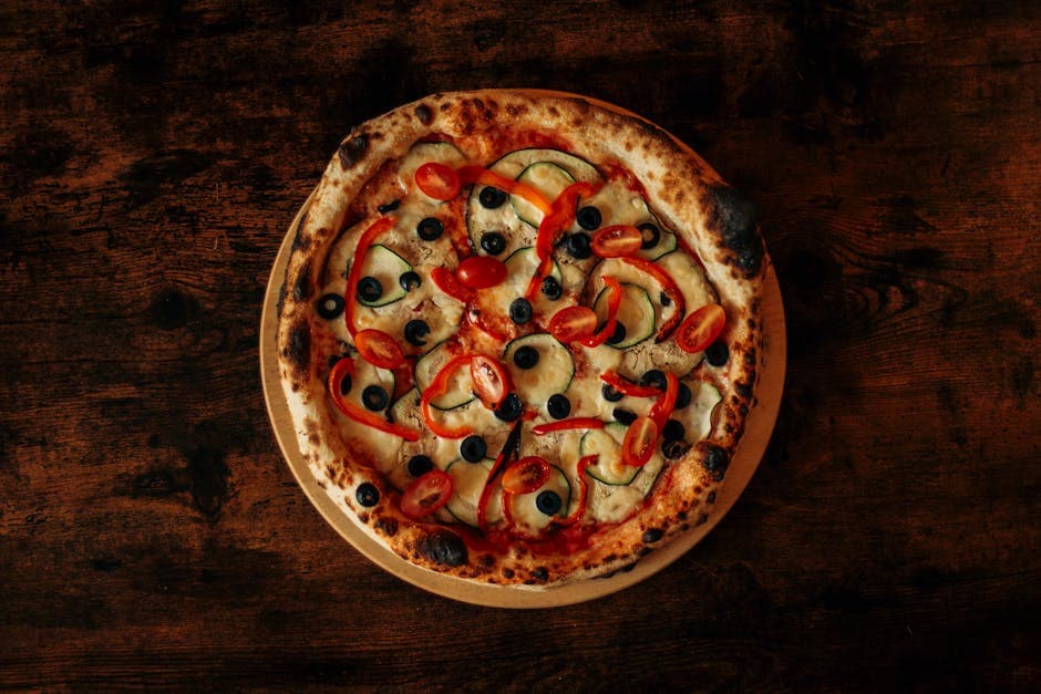 Kreativ pizza med oliven og paprika