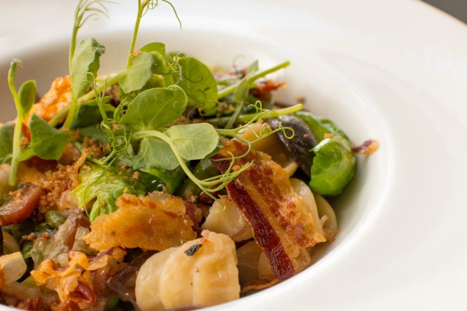 Ferske erteravioli med sprø prosciutto