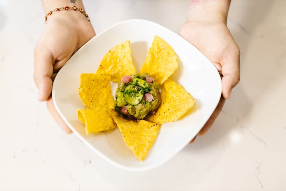 Hummernachos med asiatisk guacamole og krydret rømme