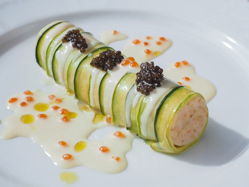 Krabbe-fylte squashblomster med sennepssmørsaus