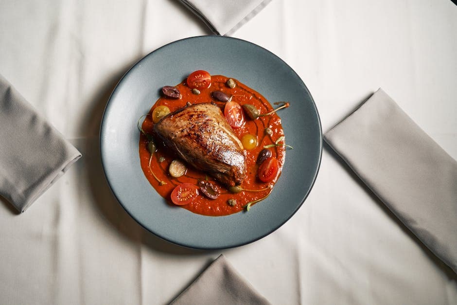 Kalveskiver med oliven- og soltørket tomatsaus