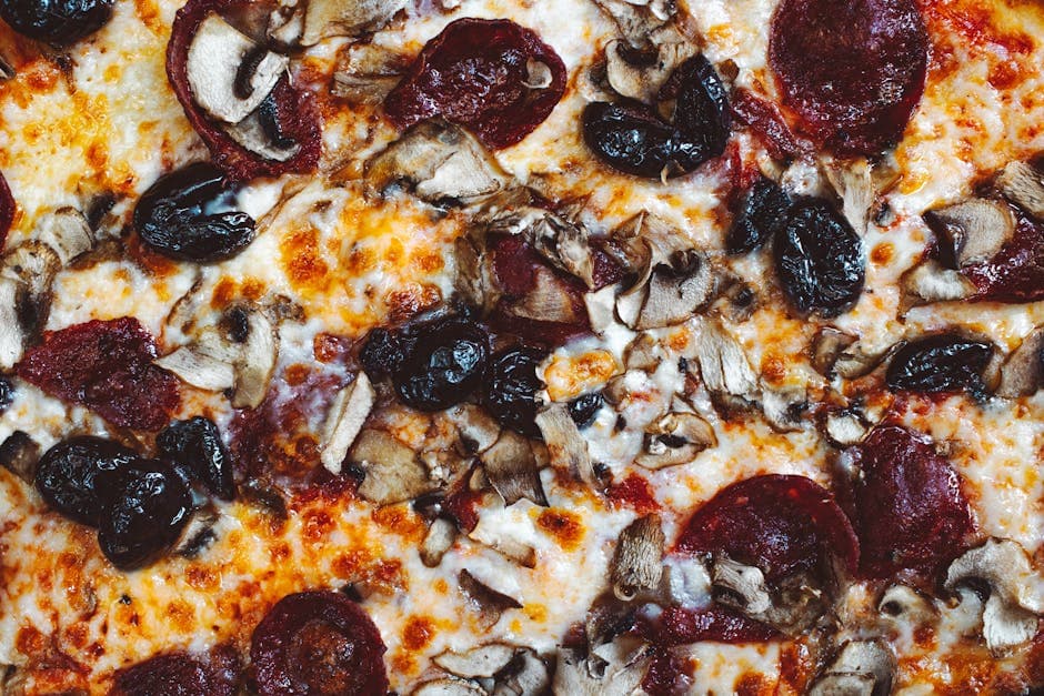 Deluxe ovnsbakt pizza med spekemat og sopp