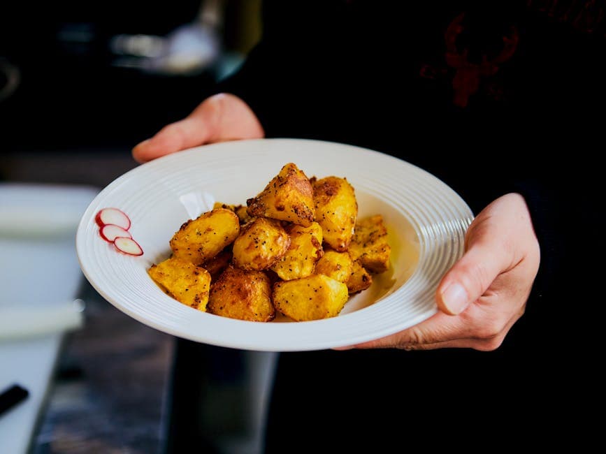 Sprø parmesanpoteter fra ovnen