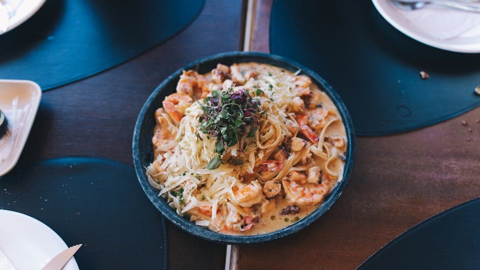 Pasta med kremet sjømat og grønnsaker