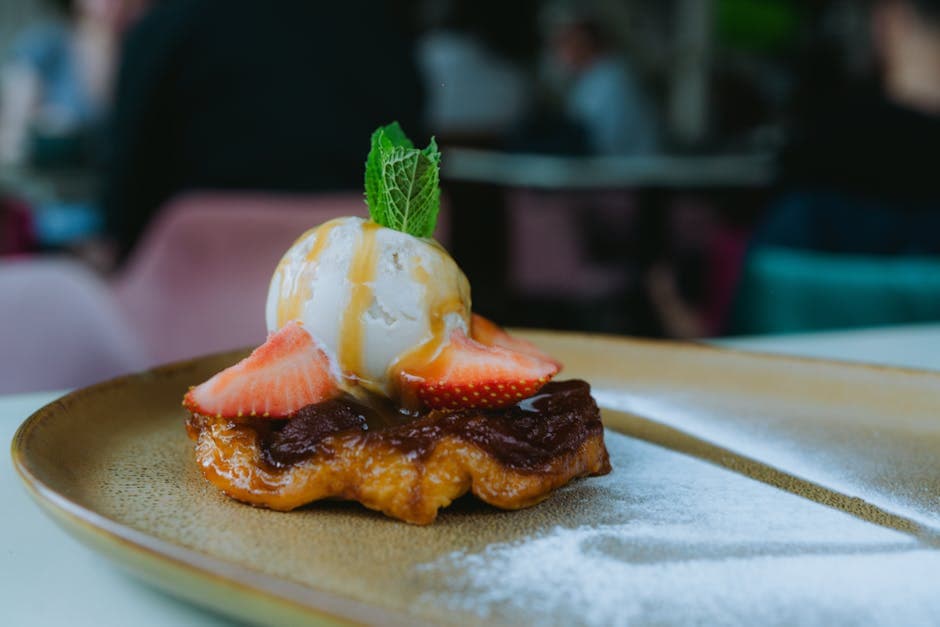 Jordbær i appelsin- og karamellsaus