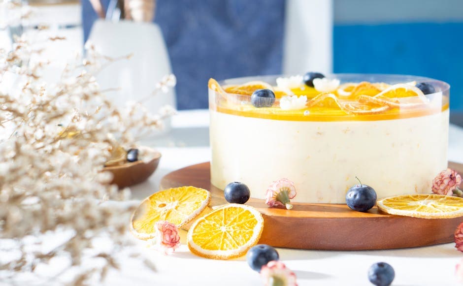 Ostekake med kandiserte kumquats og appelsin