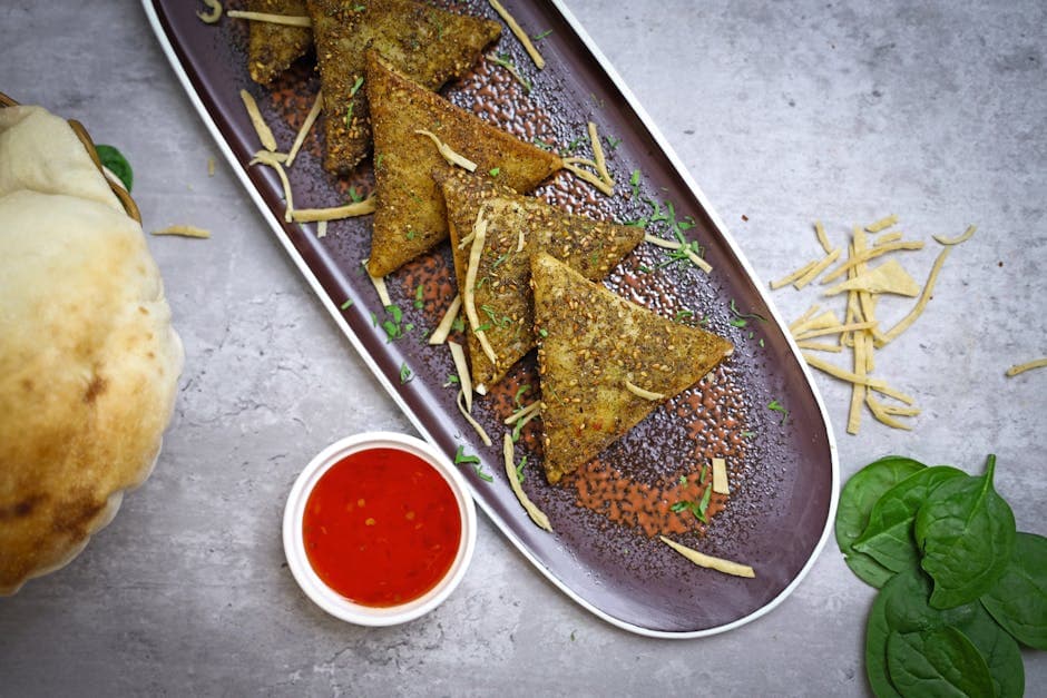 Karrilammesamosas med aprikoschutney