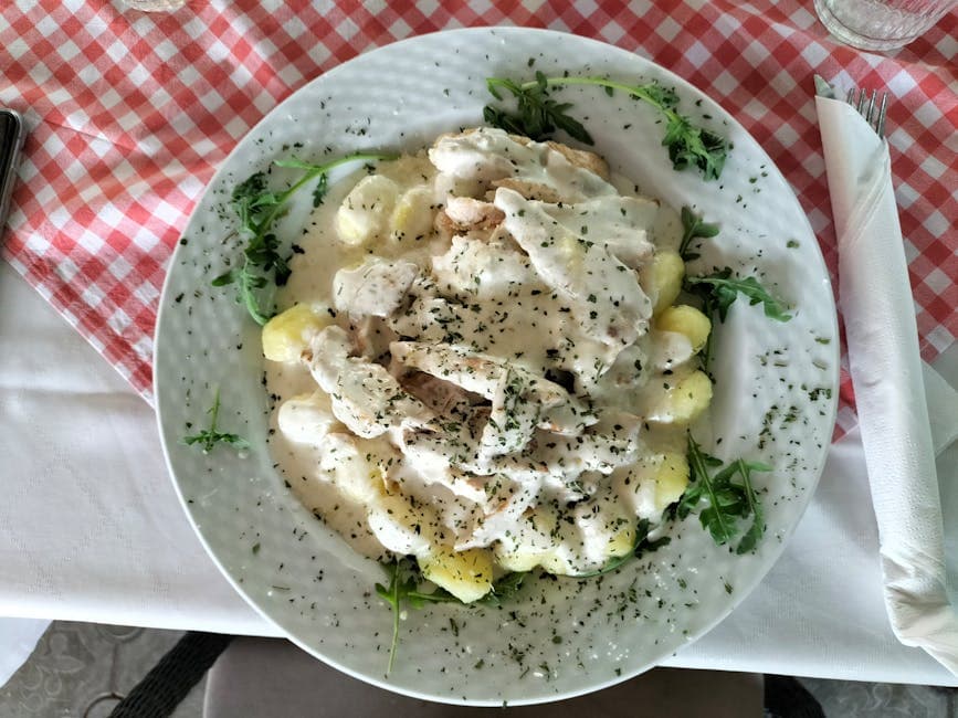 Ricotta-gnocchi med kremet pestosaus