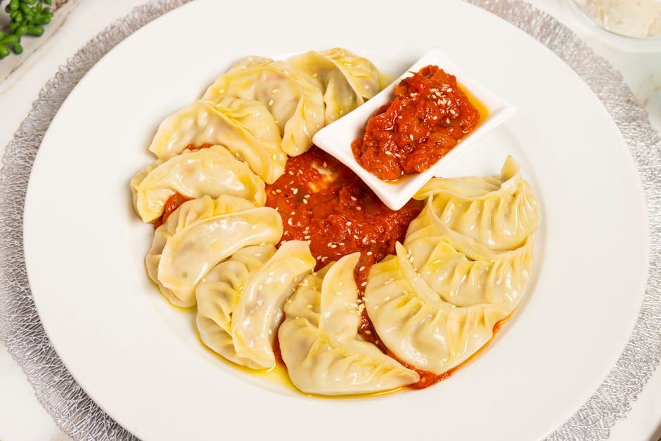 Parmesan- og ruccoladumplings med tomatsaus