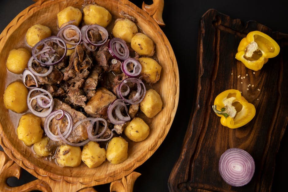 Bakte poteter fylt med oksegryte og løk