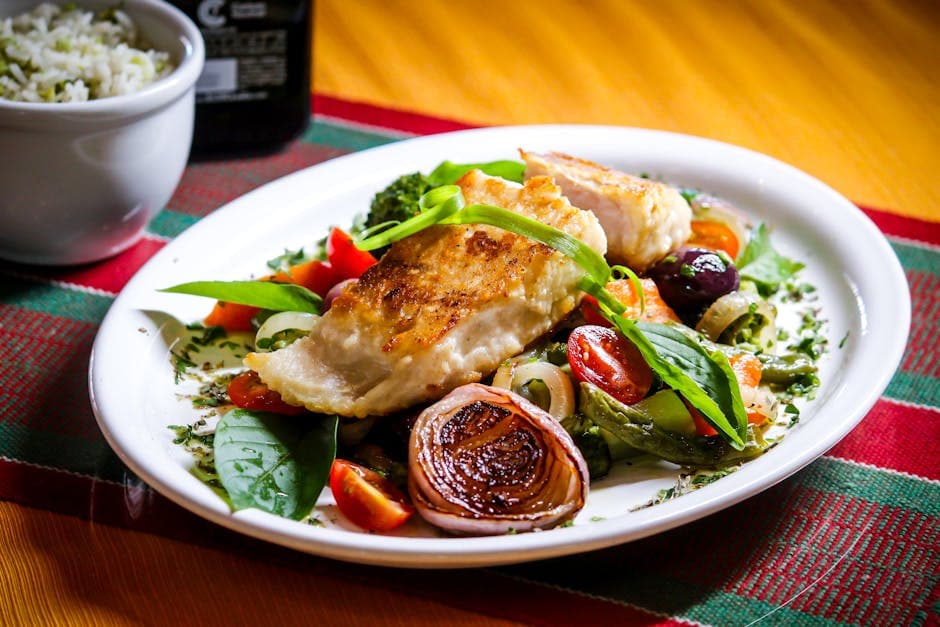 Mahimahi med grillet løk, tomater og tapenadevinaigrette