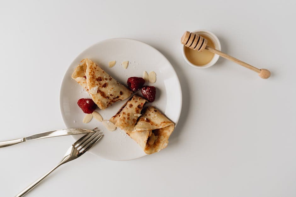 Bokhvetecrêpes med honningricotta og sauterte plommer