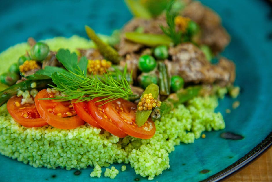 Kremet quinoa med erter, parmesan og ovnsbakte tomater