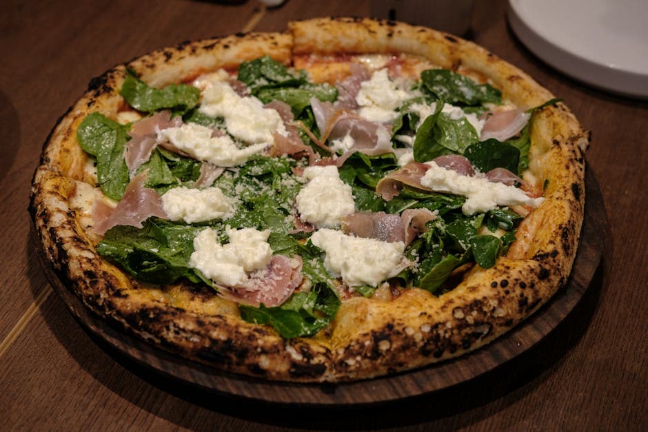 Prosciutto- og geitostpizza