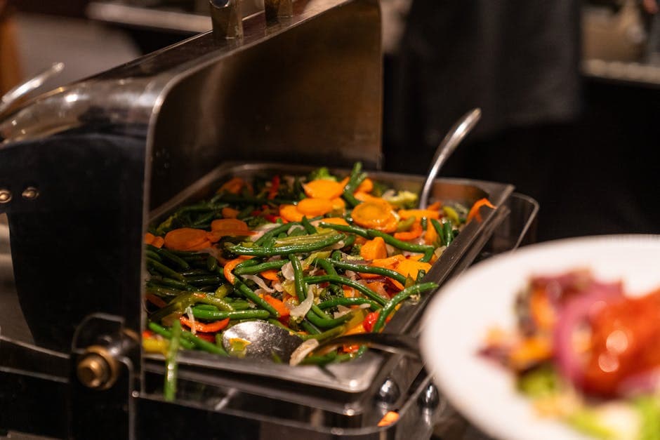 Dampstekte grønne bønner med mandler og persille