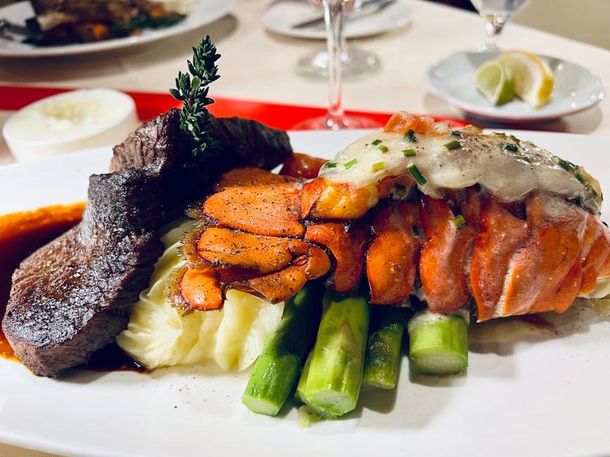 Surf & Turf: Biff, kamskjell og asparges med Manhattan-saus