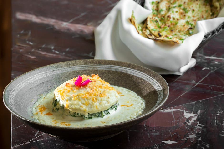 Matzo Brei med kremet spinat og sprø løk