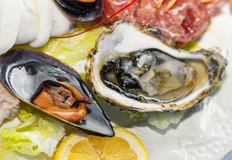 Oransjebakt sjømat og østers med hvit misosaus