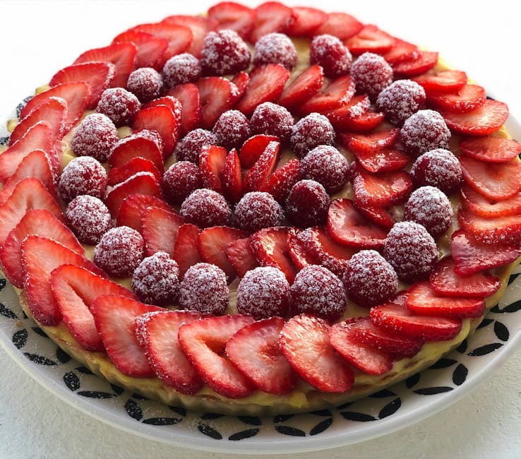 Jordbær- og bringebærtærte med mandelfrangipane