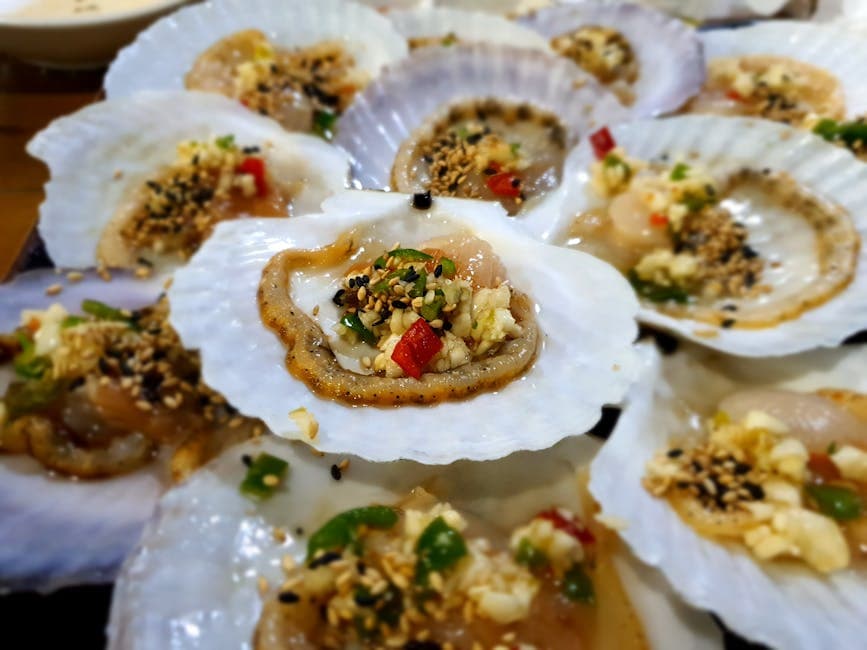 Grillede kamskjell med hvitløkssmør