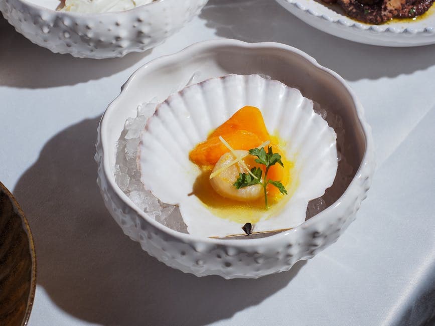 Gratinerte sjøscallops i skjell