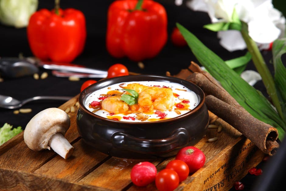 Kremet krabbesuppe med kamskjell, paprika og erter