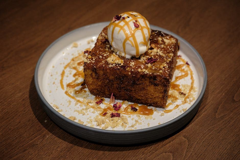 Delikat brødpudding med appelsinsaus