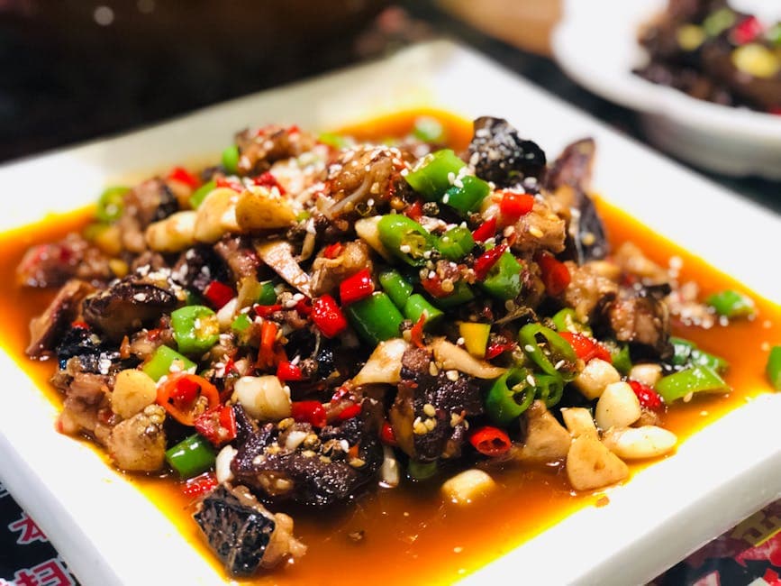 Szechuan aubergine med kjøtt og reker