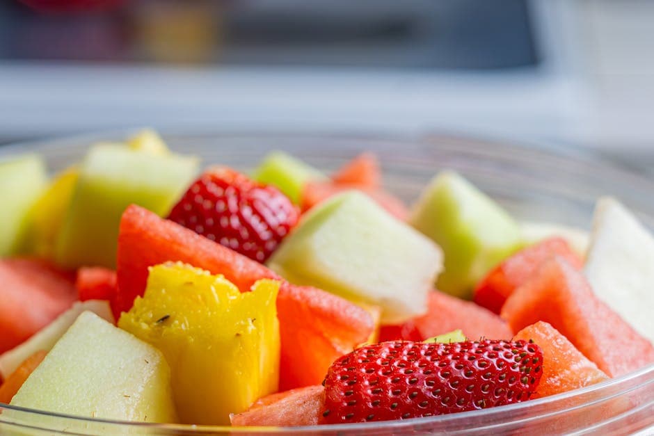 Fruktsalat med ananas, melon og mango